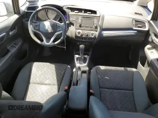 2015 Honda Fit LX с VIN 3HGGK5H5XFM723903, выставлен на аукционе Copart как лот 57249685 с пробегом 90 949 миль миль и Списание • Salvage title. История ставок и продаж доступна на DreamBid. Изображение 8.