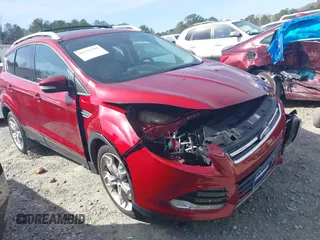 2016 Ford Escape Titanium with VIN 1FMCU0J93GUB11073, listed as a IAAI auction lot 41751349 with 92,000 mi miles. Bid and sale history available at carsss.com. Image 1.