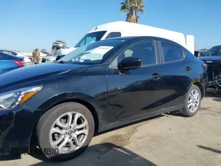 2016 Scion iA z VIN 3MYDLBZV4GY140248, wystawiony jako IAAI lot #42282531 z przebiegiem 72 644 mil mil oraz . Historia ofert i sprzedaży dostępna na DreamBid. Obrazek 14.