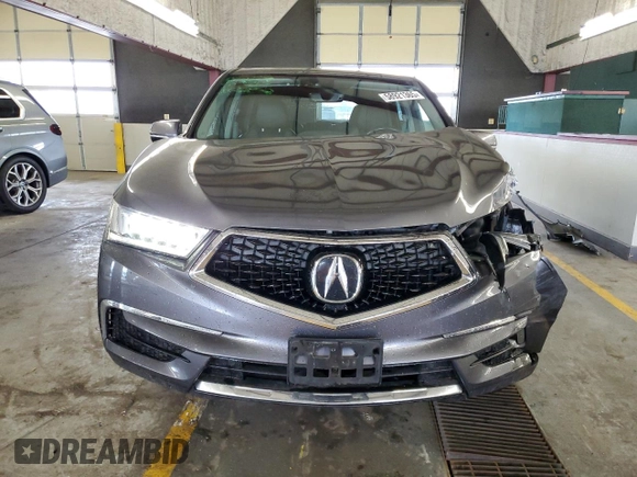 2018 Acura MDX Technology с VIN 5J8YD4H57JL016129, выставлен на аукционе Copart как лот 58921365 с пробегом 99 051 миль миль и Списание • Salvage title. История ставок и продаж доступна на DreamBid. Изображение 5.