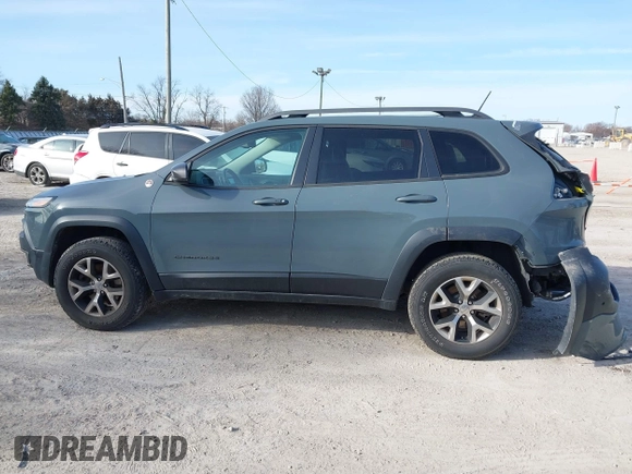 2014 Jeep Cherokee Trailhawk z VIN 1C4PJMBS5EW147579, wystawiony jako IAAI lot #41781543 z przebiegiem 155 751 mil mil oraz . Historia ofert i sprzedaży dostępna na DreamBid. Obrazek 15.