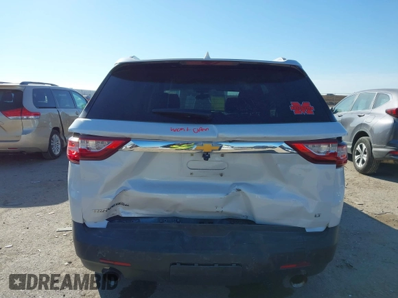 2018 Chevrolet Traverse LT Cloth z VIN 1GNERGKW9JJ214512, wystawiony jako IAAI lot #41397519 z przebiegiem 100 342 mil mil oraz . Historia ofert i sprzedaży dostępna na DreamBid. Obrazek 6.