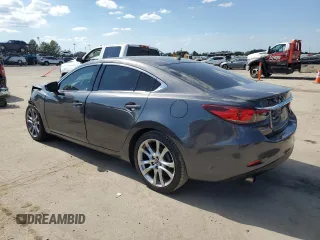 2014 Mazda 6 i Grand Touring с VIN JM1GJ1W67E1135264, выставлен на аукционе Copart как лот 70587624 с пробегом 86 926 миль миль и Списание • Salvage title. История ставок и продаж доступна на DreamBid. Изображение 2.