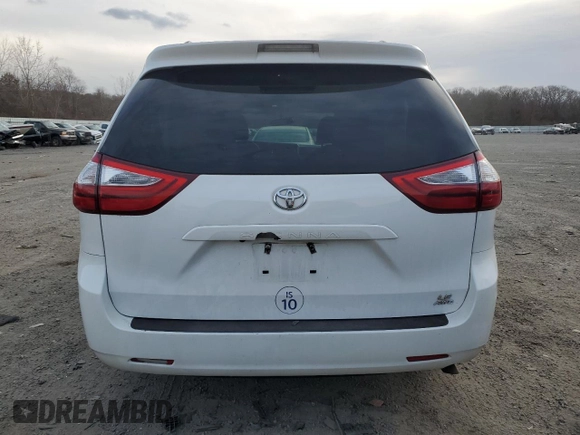 2017 Toyota Sienna LE with VIN 5TDJZ3DCXHS180970, listed as a Copart auction lot 88876535 with 180,318 mi miles and Salvage Title. Bid and sale history available at carsss.com. Image 6.