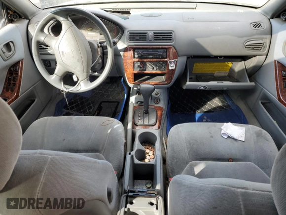 2000 Mitsubishi Galant with VIN 4A3AA46LXYE179220, listed as a Copart auction lot 44615815 with 142,054 mi miles and Salvage Title. Bid and sale history available at DreamBid. Image 8.