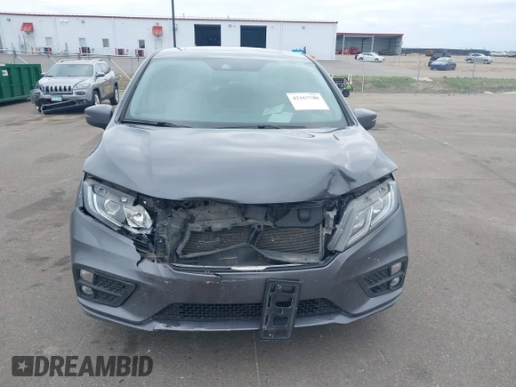 2018 Honda Odyssey EX-L z VIN 5FNRL6H72JB090127, wystawiony jako IAAI lot #42167788 z przebiegiem 114 984 mil mil oraz . Historia ofert i sprzedaży dostępna na DreamBid. Obrazek 12.