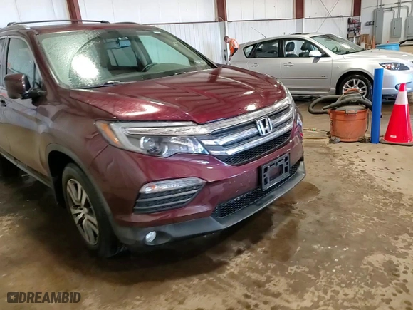 2016 Honda Pilot EX-L with VIN 5FNYF6H58GB015099, listed as a Copart auction lot 52280235 with 61,685 mi miles and Salvage Title. Bid and sale history available at carsss.com. Image 14.