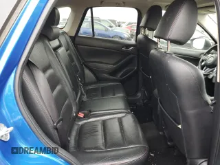 2013 Mazda CX-5 Grand Touring with VIN JM3KE4DE3D0146672, listed as a Copart auction lot 49133105 with 151,874 mi miles and Salvage Title. Bid and sale history available at carsss.com. Image 11.