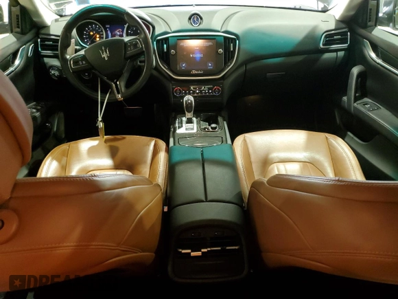 2015 Maserati Ghibli z VIN ZAM57XSA9F1139087, wystawiony jako Copart lot #52235355 z przebiegiem 68 788 mil mil oraz Szkoda całkowita • Salvage title. Historia ofert i sprzedaży dostępna na DreamBid. Obrazek 8.