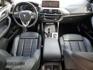 2019 BMW X4 M40i with VIN 5UXUJ5C5XKLJ64004, listed as a Copart auction lot 52106895 with 74,599 mi miles and Salvage title. Bid and sale history available at DreamBid. Image 8.