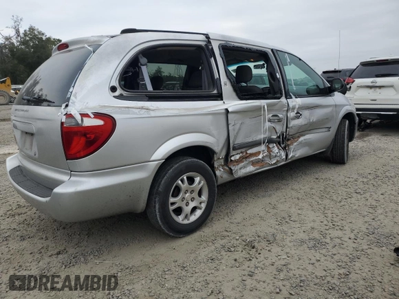 2005 Dodge Caravan with VIN 1D4GP24RX5B110826, listed as a Copart auction lot 82460834 with 157,308 mi miles and Salvage Title. Bid and sale history available at carsss.com. Image 3.