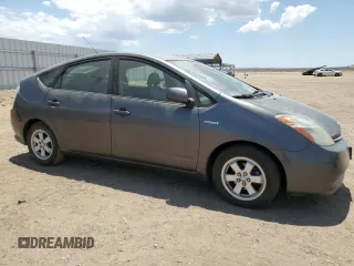 2007 Toyota Prius z VIN JTDKB20U773262222, wystawiony jako Copart lot #59323905 z przebiegiem 138 274 mil mil oraz Czysty tytuł • Clean title. Historia ofert i sprzedaży dostępna na DreamBid. Obrazek 4.