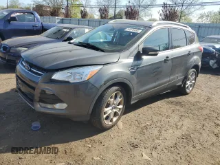 2016 Ford Escape Titanium z VIN 1FMCU9JX5GUB64344, wystawiony jako Copart lot #54976485 z przebiegiem 190 183 mil mil oraz Szkoda całkowita • Salvage title. Historia ofert i sprzedaży dostępna na DreamBid. Obrazek 1.