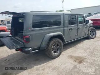 2021 Jeep Gladiator Rubicon with VIN 1C6JJTBG8ML619972, listed as a IAAI auction lot 42057805 with 37,875 mi miles and . Bid and sale history available at DreamBid. Image 4.