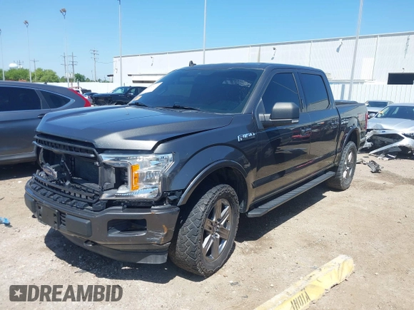 2020 Ford F-150 XL with VIN 1FTEW1E50LKE93170, listed as a IAAI auction lot 41918973 with 99,117 mi miles and . Bid and sale history available at carsss.com. Image 2.