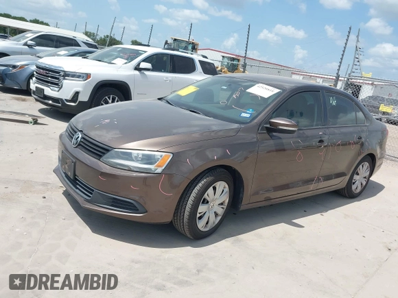 2012 Volkswagen Jetta SE with VIN 3VWDX7AJ3CM121987, listed as a IAAI auction lot 42520818 with 149,997 mi miles and . Bid and sale history available at DreamBid. Image 2.