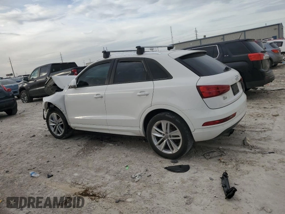 2017 Audi Q3 Premium z VIN WA1BCCFS0HR016968, wystawiony jako Copart lot #79358604 z przebiegiem Nie podano mil oraz Szkody całkowita. Historia ofert i sprzedaży dostępna na DreamBid. Obrazek 2.