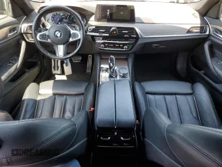 2018 BMW 5 Series 530e with VIN WBAJA9C50JB252458, listed as a Copart auction lot 58697585 with 89,050 mi miles and Salvage title. Bid and sale history available at DreamBid. Image 8.