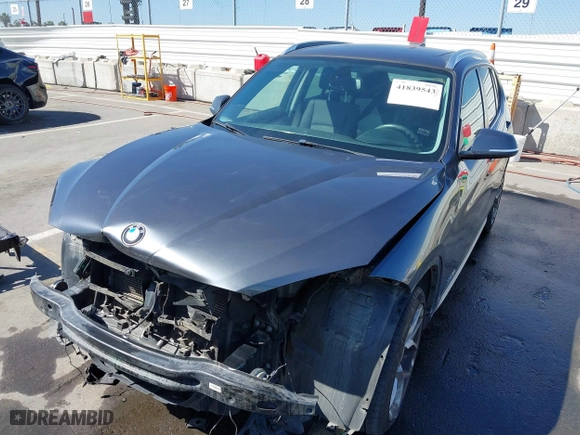 2014 BMW X1 xDrive28i with VIN WBAVL1C57EVY23722, listed as a IAAI auction lot 41839543 with 121,742 mi miles. Bid and sale history available at carsss.com. Image 6.