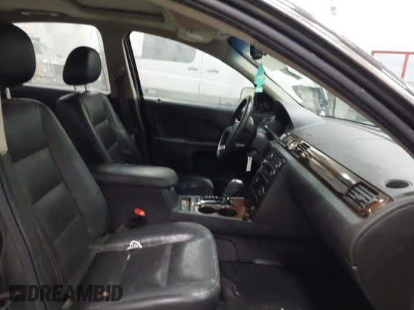 2008 Ford Taurus Limited with VIN 1FAHP28W08G141243, listed as a IAAI auction lot 41327967 with 157,482 mi miles. Bid and sale history available at carsss.com. Image 5.