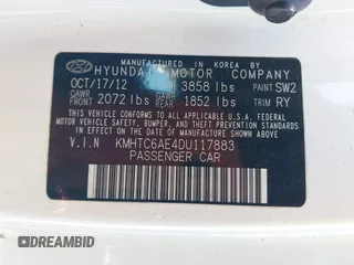 2013 Hyundai Veloster Turbo z VIN KMHTC6AE4DU117883, wystawiony jako IAAI lot #41805601 z przebiegiem Nie podano mil oraz . Historia ofert i sprzedaży dostępna na DreamBid. Obrazek 9.