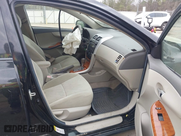 2009 Toyota Corolla with VIN 1NXBU40E69Z027673, listed as a IAAI auction lot 41882106 with 168,313 mi miles. Bid and sale history available at carsss.com. Image 5.