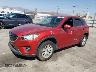 2014 Mazda CX-5 Touring with VIN JM3KE2CY9E0356050, listed as a Copart auction lot 65470674 with 70,400 mi miles and Salvage Title. Bid and sale history available at DreamBid. Image 1.