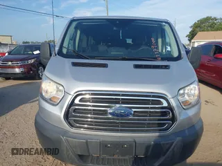 2018 Ford Transit Passenger XL with VIN 1FBZX2YM0JKA70128, listed as a IAAI auction lot 42379000 with 125,309 mi miles and . Bid and sale history available at DreamBid. Image 12.