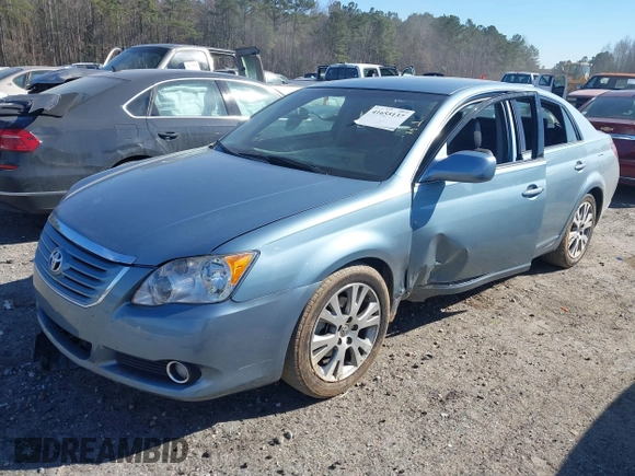 2008 Toyota Avalon XL with VIN 4T1BK36BX8U294231, listed as a IAAI auction lot 41655137 with 119,847 mi miles. Bid and sale history available at carsss.com. Image 2.