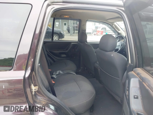 2004 Jeep Grand Cherokee Laredo z VIN 1J4GW48S94C209326, wystawiony jako IAAI lot #42309565 z przebiegiem 159 429 mil mil oraz . Historia ofert i sprzedaży dostępna na DreamBid. Obrazek 8.