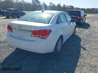 2016 Chevrolet Cruze Limited LT with VIN 1G1PE5SB0G7137297, listed as a IAAI auction lot 41822034 with 137,419 mi miles. Bid and sale history available at carsss.com. Image 4.