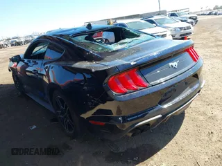 2021 Ford Mustang EcoBoost with VIN 1FA6P8TH2M5104154, listed as a IAAI auction lot 41869810 with 15,561 mi miles and . Bid and sale history available at DreamBid. Image 3.