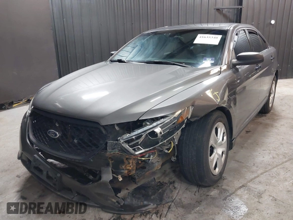 2015 Ford Police Interceptor z VIN 1FAHP2MK4FG119536, wystawiony jako IAAI lot #41635340 z przebiegiem 165 322 mil mil oraz . Historia ofert i sprzedaży dostępna na DreamBid. Obrazek 19.