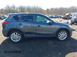 2013 Mazda CX-5 Grand Touring with VIN JM3KE4DE1D0164488, listed as a IAAI auction lot 41683326 with 129,989 mi miles. Bid and sale history available at carsss.com. Image 13.