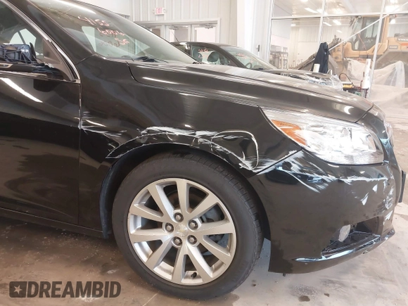 2013 Chevrolet Malibu LTZ with VIN 1G11H5SA1DU129095, listed as a IAAI auction lot 41556006 with 170,477 mi miles and . Bid and sale history available at DreamBid. Image 6.