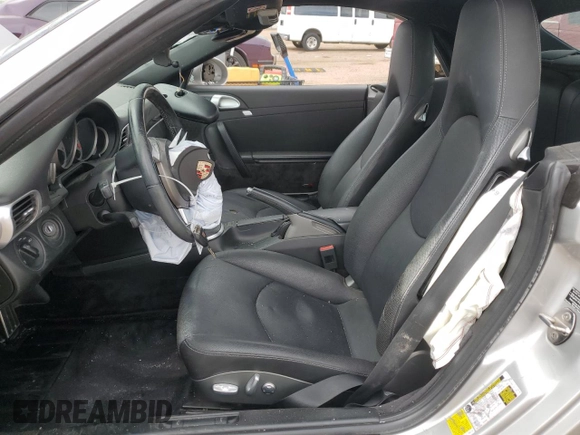 2009 Porsche 911 Carrera S with VIN WP0CB29919S755552, listed as a Copart auction lot 59403325 with 57,990 mi miles and Salvage title. Bid and sale history available at DreamBid. Image 7.