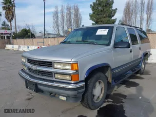 1997 Chevrolet Suburban with VIN 1GNFK16R2VJ365448, listed as a IAAI auction lot 41689906 with 228,151 mi miles. Bid and sale history available at carsss.com. Image 2.