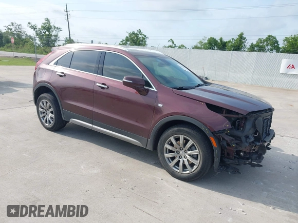 2023 Cadillac XT4 FWD Premium Luxury with VIN 1GYFZCR47PF106017, listed as a IAAI auction lot 42283401 with 40,734 mi miles and . Bid and sale history available at DreamBid. Image 1.