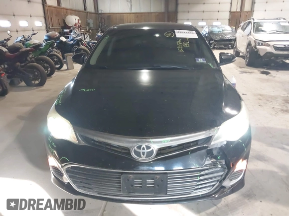 2014 Toyota Avalon Limited with VIN 4T1BK1EB0EU114093, listed as a IAAI auction lot 41311332 with 103,479 mi miles and . Bid and sale history available at DreamBid. Image 12.