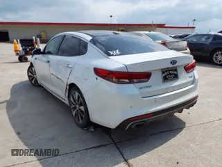 2016 Kia Optima SXL Turbo with VIN 5XXGV4L26GG015874, listed as a IAAI auction lot 42127366 with 166,970 mi miles. Bid and sale history available at carsss.com. Image 3.