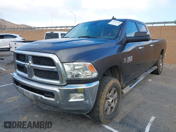 2017 Ram 2500 SLT z VIN 3C6UR5JL4HG570952, wystawiony jako IAAI lot #41456094 z przebiegiem 245 785 mil mil oraz . Historia ofert i sprzedaży dostępna na DreamBid. Obrazek 2.