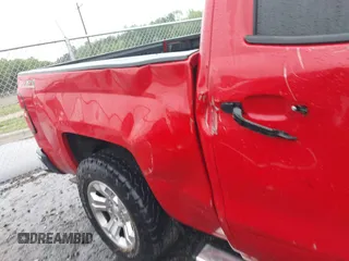 2014 Chevrolet Silverado 1500 LT with VIN 3GCUKREC9EG210621, listed as a IAAI auction lot 42011581 with Not Provided miles and . Bid and sale history available at DreamBid. Image 19.