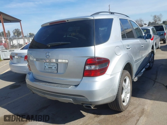 2006 Mercedes-Benz M 350 with VIN 4JGBB86EX6A031095, listed as a IAAI auction lot 41631132 with 167,985 mi miles and . Bid and sale history available at DreamBid. Image 4.