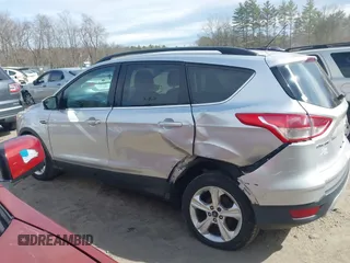 2016 Ford Escape SE with VIN 1FMCU9GXXGUB10447, listed as a IAAI auction lot 41879610 with 137,913 mi miles. Bid and sale history available at carsss.com. Image 14.