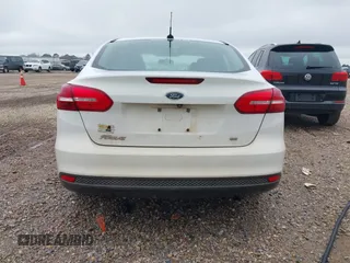 2018 Ford Focus SE z VIN 1FADP3F23JL225333, wystawiony jako IAAI lot #41758445 z przebiegiem 133 307 mil mil oraz . Historia ofert i sprzedaży dostępna na DreamBid. Obrazek 16.