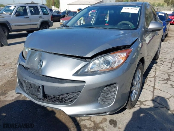 2012 Mazda Mazda3 i Touring with VIN JM1BL1V86C1628339, listed as a IAAI auction lot 42021006 with 153,771 mi miles. Bid and sale history available at carsss.com. Image 12.