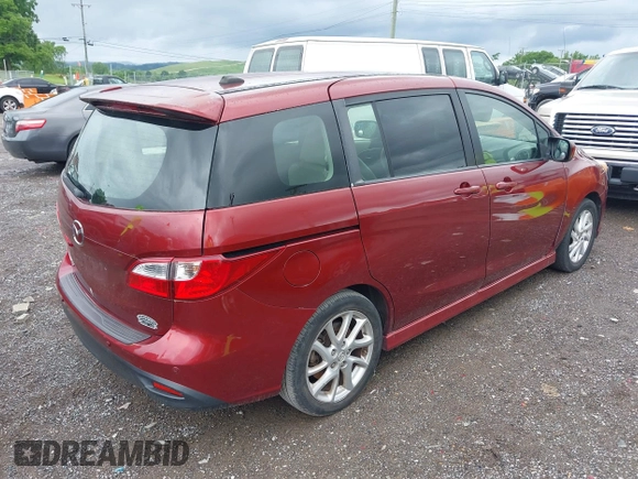 2012 Mazda 5 Grand Touring with VIN JM1CW2DLXC0134997, listed as a IAAI auction lot 42360574 with 230,951 mi miles and . Bid and sale history available at DreamBid. Image 4.