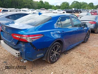 2019 Toyota Camry LE z VIN 4T1B11HK8KU161060, wystawiony jako IAAI lot #42255778 z przebiegiem 104 827 mil mil oraz . Historia ofert i sprzedaży dostępna na DreamBid. Obrazek 4.