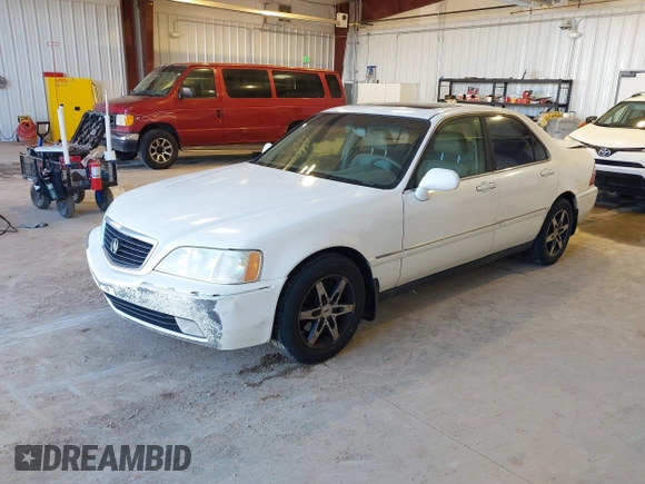1999 Acura RL with VIN JH4KA9661XC007276, listed as a IAAI auction lot 41686607 with 249,992 mi miles. Bid and sale history available at carsss.com. Image 2.