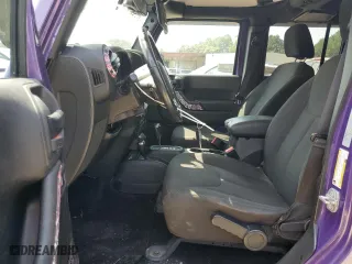 2018 Jeep Wrangler JK Unlimited Sport S with VIN 1C4BJWDGXJL911081, listed as a Copart auction lot 69205464 with 117,576 mi miles and Salvage Title. Bid and sale history available at carsss.com. Image 7.